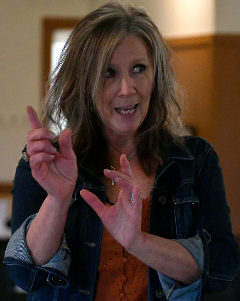 Director Kendra Chappell speaks to the company of "The Milly Project"